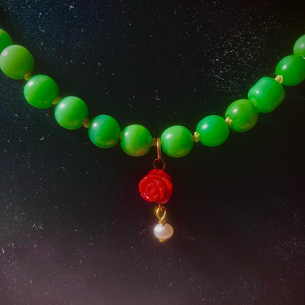 Green and Red Beaded Necklace with Rose Pendant